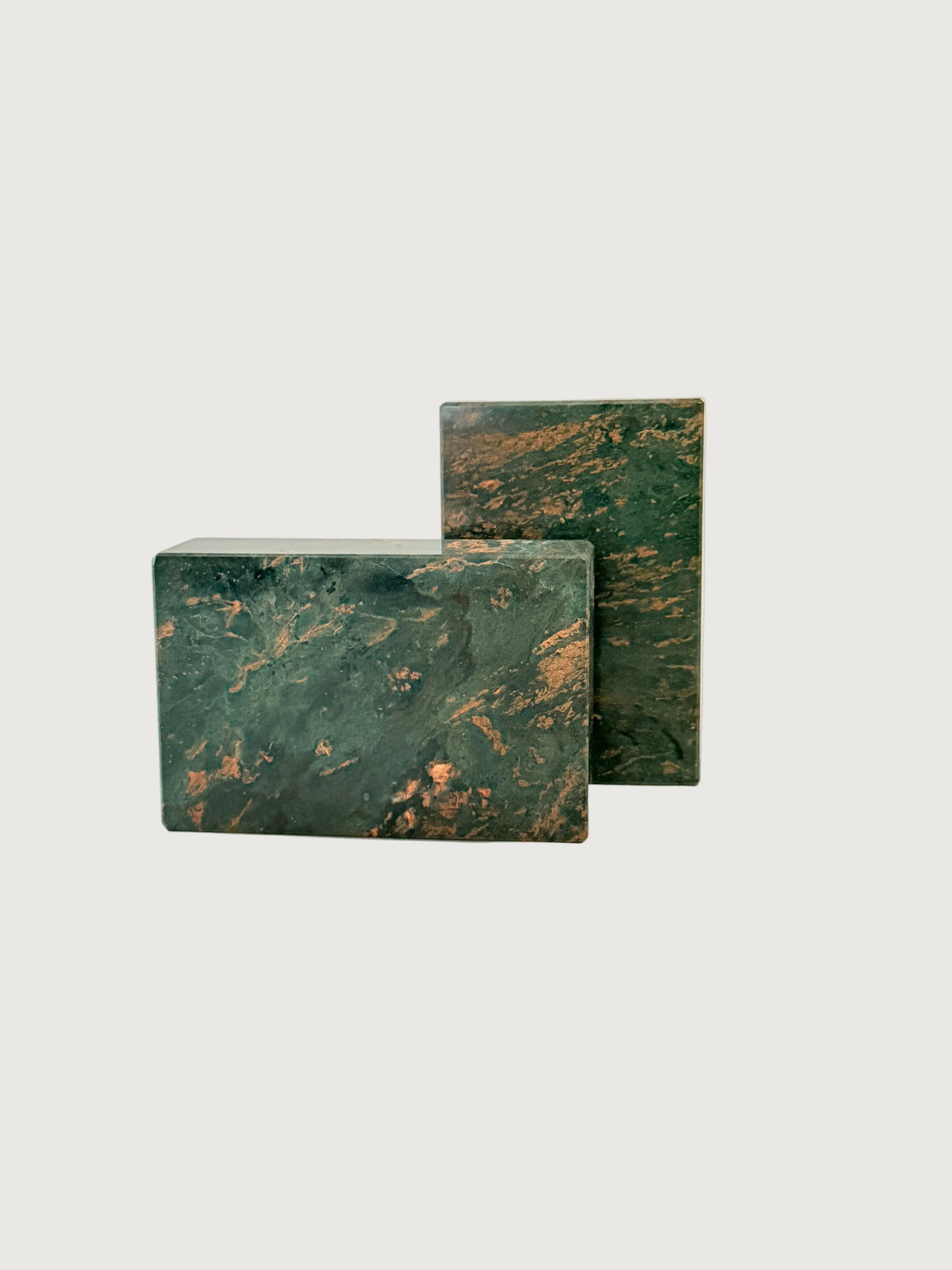 A pair of heavy rectangular green and salmon-colored vintage marble bookends. 