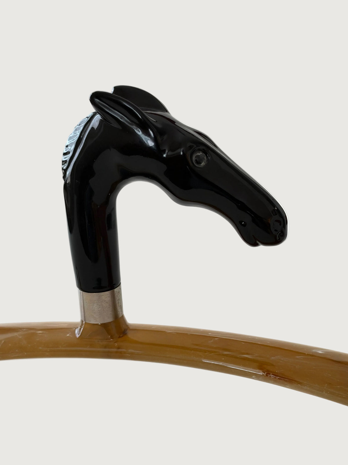 Detail shot of black horse head hanger