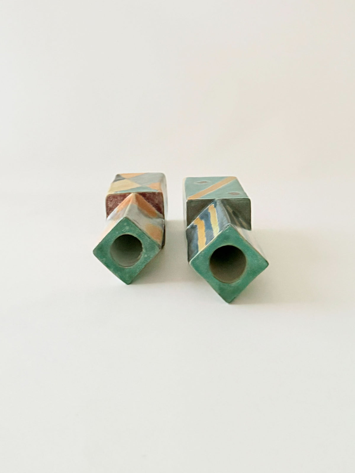 Two ceramic candleholders 